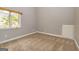Cozy bedroom with neutral carpet and a window overlooking the outdoors at 171 Rockspray Rdg, Peachtree City, GA 30269