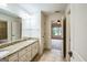 Bathroom with double sink vanity, tile flooring, and lots of space at 3393 Willow Glen Trl, Suwanee, GA 30024