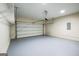Spacious two car garage with sealed concrete flooring at 3393 Willow Glen Trl, Suwanee, GA 30024