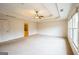 Large main bedroom features tray ceiling, plush carpeting, and natural light at 3393 Willow Glen Trl, Suwanee, GA 30024