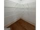 Walk in pantry with white, wire shelving at 3393 Willow Glen Trl, Suwanee, GA 30024