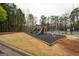Community playground with swingset, slides and climbing structure at 3393 Willow Glen Trl, Suwanee, GA 30024