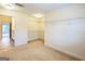 Walk-in closet featuring custom shelving and plush carpet at 3393 Willow Glen Trl, Suwanee, GA 30024