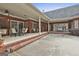 Covered outdoor patio with backyard views and ample seating space at 3530 Highway 81 W, Hampton, GA 30228