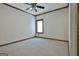 Cozy bedroom featuring carpeted flooring, a window, and neutral wall color at 3530 Highway 81 W, Hampton, GA 30228