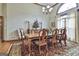 Elegant dining room featuring a large table, chandelier, and ample seating at 3530 Highway 81 W, Hampton, GA 30228