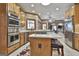 Modern kitchen with stainless steel appliances and a large island with barstool seating at 3530 Highway 81 W, Hampton, GA 30228