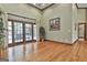 Bright living room with hardwood floors and sliding doors that lead to outdoor space at 3530 Highway 81 W, Hampton, GA 30228