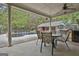 Open-air pool patio with seating, grill, and view of the refreshing in-ground pool at 3530 Highway 81 W, Hampton, GA 30228