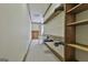 Spacious walk-in closet with shelving, carpet, and ample storage space at 3530 Highway 81 W, Hampton, GA 30228