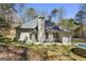 Backyard featuring a patio and grassy area, perfect for outdoor entertaining and recreation at 5163 Holly Springs Dr, Douglasville, GA 30135
