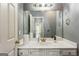 Bathroom featuring a white vanity and large mirror at 5163 Holly Springs Dr, Douglasville, GA 30135