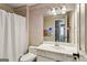 Bathroom with white vanity and shower at 5163 Holly Springs Dr, Douglasville, GA 30135