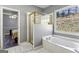Bathroom with separate tub and tiled shower at 5163 Holly Springs Dr, Douglasville, GA 30135