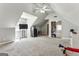 Large bedroom features carpet, ceiling fan, closet, and plenty of natural light at 5163 Holly Springs Dr, Douglasville, GA 30135