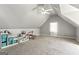 Spacious bonus room with neutral carpet at 5163 Holly Springs Dr, Douglasville, GA 30135