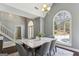 Bright dining area with a large window and stylish table perfect for entertaining at 5163 Holly Springs Dr, Douglasville, GA 30135