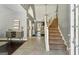 Open foyer showcasing staircase and entryway at 5163 Holly Springs Dr, Douglasville, GA 30135
