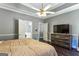 Spacious bedroom with hardwood floors and ensuite bathroom at 5163 Holly Springs Dr, Douglasville, GA 30135