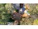 Aerial view of home with mature trees, driveway, and well-maintained landscaping at 135 Horseshoe Cir, Fayetteville, GA 30215