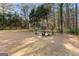 Expansive backyard featuring a classic gazebo surrounded by mature trees at 135 Horseshoe Cir, Fayetteville, GA 30215