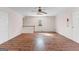 Finished bonus room features brick floors, ceiling fan and natural light at 135 Horseshoe Cir, Fayetteville, GA 30215