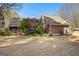 Charming two-story home with a beautifully landscaped backyard and screened in porch at 135 Horseshoe Cir, Fayetteville, GA 30215