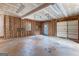 Spacious garage with unfinished walls, concrete floor, and ample room for storage and vehicles at 135 Horseshoe Cir, Fayetteville, GA 30215