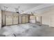 Spacious two-car garage featuring ample storage and a well-lit interior at 135 Horseshoe Cir, Fayetteville, GA 30215