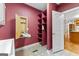 The laundry room features shelving, ironing board, and access to the kitchen at 135 Horseshoe Cir, Fayetteville, GA 30215