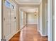 Welcoming foyer with hardwood floors leading to a dining area, creating an inviting entry at 233 Creekstone Bnd, Peachtree City, GA 30269