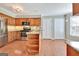 Spacious kitchen with stainless appliances, central island with storage, and light wood cabinets at 233 Creekstone Bnd, Peachtree City, GA 30269