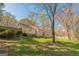 The beautiful backyard features green grass and a nice fence, perfect for outdoor enjoyment at 104 Amberidge Nw Dr, Cartersville, GA 30121