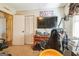 Cozy bedroom featuring a tidy desk area and a comfortable chair for a relaxed workspace or study at 104 Amberidge Nw Dr, Cartersville, GA 30121
