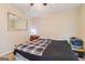 The bedroom is illuminated by a ceiling fan and features a comfortable bed and storage at 104 Amberidge Nw Dr, Cartersville, GA 30121