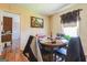 Inviting dining area offering plenty of natural light, creating a warm and welcoming atmosphere for meals at 104 Amberidge Nw Dr, Cartersville, GA 30121