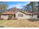 Charming single-story home featuring a welcoming front porch and traditional architecture at 104 Amberidge Nw Dr, Cartersville, GA 30121