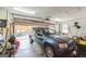 A well-lit two-car garage with ample storage space and an overhead door at 104 Amberidge Nw Dr, Cartersville, GA 30121