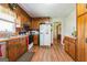 View of the Kitchen with stainless steel sink, oven, refrigerator, and wood cabinets at 104 Amberidge Nw Dr, Cartersville, GA 30121