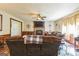 A inviting living room with a stone fireplace, a ceiling fan, and comfortable seating for relaxation at 104 Amberidge Nw Dr, Cartersville, GA 30121