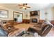 Inviting living room with a stone fireplace, creating a cozy and warm atmosphere for relaxation and entertainment at 104 Amberidge Nw Dr, Cartersville, GA 30121