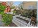 Backyard garden with raised planting beds, a white picket fence, and mature landscaping at 1009 Institute Nw St, Conyers, GA 30012