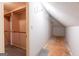 Unfinished attic space with visible studs and rafters, ideal for conversion or storage at 115 Flagstop Run, Fayetteville, GA 30215