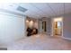 Basement featuring storage, an office space, and an adjacent bathroom at 115 Flagstop Run, Fayetteville, GA 30215