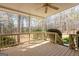 A spacious back deck overlooks the wooded area at 115 Flagstop Run, Fayetteville, GA 30215