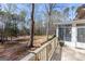 Exterior deck that overlooks the wooded backyard, with easy access to screened in porch area at 115 Flagstop Run, Fayetteville, GA 30215