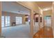 Bright, open living room features built-in shelving, fireplace, and ample natural light at 115 Flagstop Run, Fayetteville, GA 30215