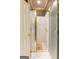 Shower stall featuring glass doors, tile surround, and a convenient grab bar for added safety at 115 Flagstop Run, Fayetteville, GA 30215