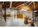 Spacious unfinished basement offering ample storage and potential for future renovation at 115 Flagstop Run, Fayetteville, GA 30215