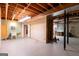Unfinished basement space with a sink, work area and potential for customization at 115 Flagstop Run, Fayetteville, GA 30215